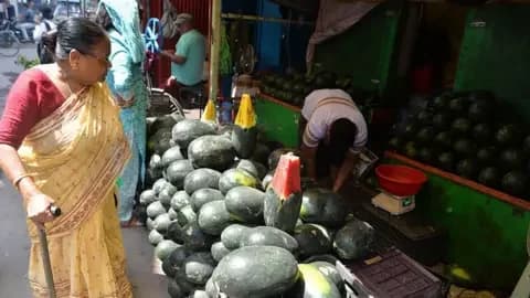 Getty Images A roadside temporary seller offers summer fruit watermelons from their shop at a market area in Siliguri, India, on May 5, 2026. (Photo by Diptendu Dutta/NurPhoto via Getty Images)