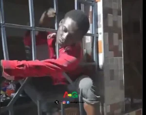 Residents Force Alleged Thief to Re-enact Narrow Escape Through Metal Fence in Viral Video