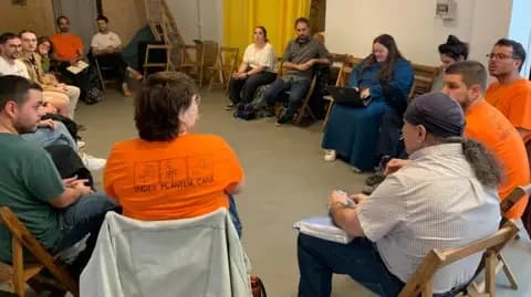 A group of local tenants in Valencia meeting with representatives of the Sindicat de Llogateres (Tenants' Union) activist group.