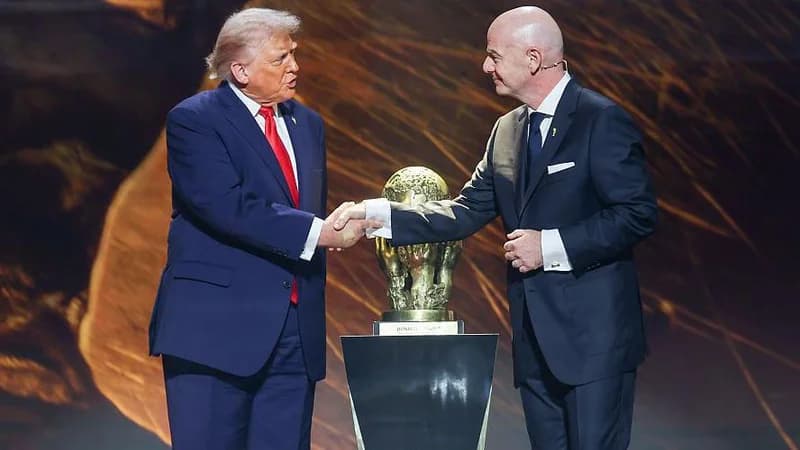 FIFA president Gianni Infantino and US President Donald Trump shake hands during the World Cup's official draw