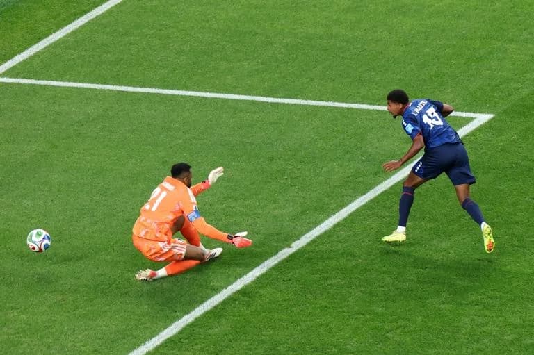 HOUSTON, TEXAS - JUNE 26: Laros Duarte #15 of Cabo Verde shoots and misses a chance against Mohammed Al-Owais #21 of Saudi Arabia during the FIFA World Cup 2026 Group H match between Cabo Verde and Saudi Arabia at Houston Stadium on June 26, 2026 in Houston, Texas. (Photo by Charlotte Wilson/Getty Images)