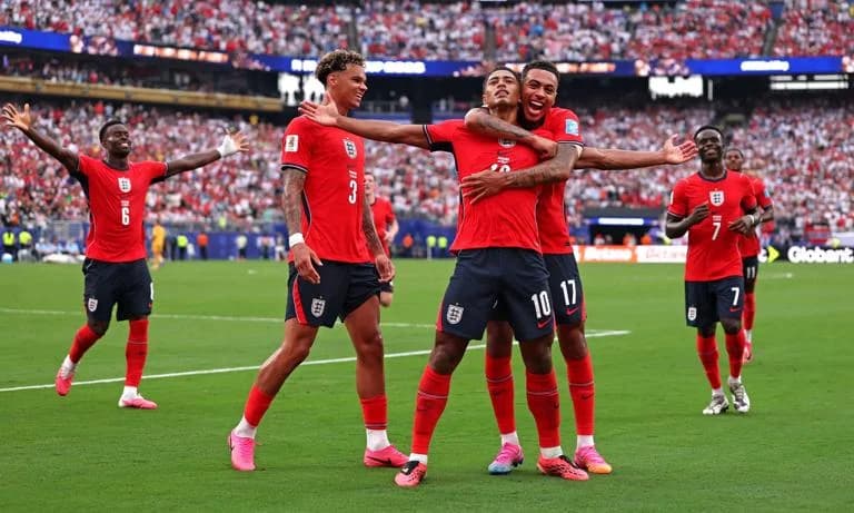 EAST RUTHERFORD, NEW JERSEY - JUNE 27: Jude Bellingham #10 of England celebrates with teammates after scoring the team's first goal during the FIFA World Cup 2026 Group L match between Panama and England at New York New Jersey Stadium on June 27, 2026 in East Rutherford, New Jersey. (Photo by Mattia Ozbot/Getty Images)