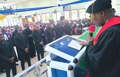 Rt Rev. Dr Lt Col Bliss Divine Agbeko (retd) administering the vows to the newly trained pastors during the commissioning rites