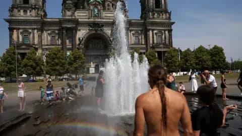 Reuters People cool off in the fountain in front of the Berlin Cathedral Berliner Dom during the ongoing heatwave.