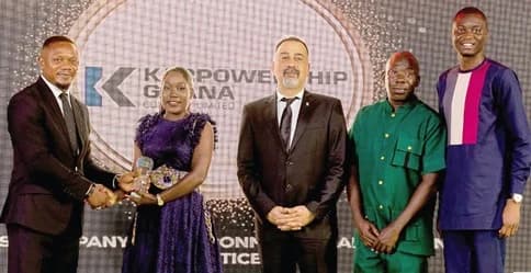 Sandra Amarquaye (2nd from left), Communications Manager of Karpowership Ghana, receiving the award from a representative of Health, Environment, Safety and Security Awards. With them are members of staff of Karpowership Ghana