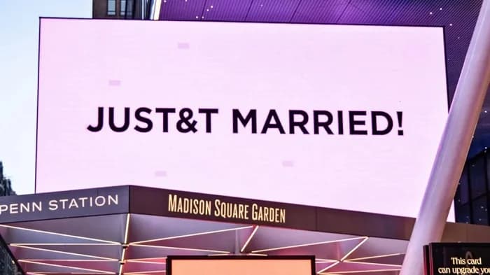 Madison Square Garden lit up a pinkish lavender colour and displayed multiple signs after the couple were wed inside