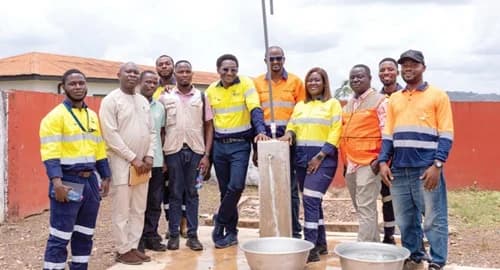 Officials of Gold Fields Foundattion and World Vision Ghana inaugurating the water system for Damang community