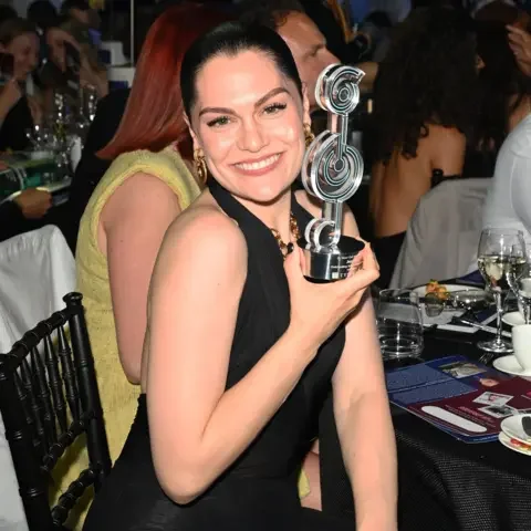 Getty Images Jessie J holds her Silver Clef Award