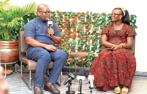 Rev. Acheampong E. S. Builderman (left), Lead Pastor and Missions Director at Thanksgiving Place Chapel and Ministries Incorporated, speaking at the launch. With him is a participant in the launch