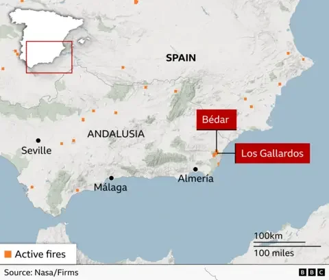 A map depicting the small town of Bedar's location in the Almeria region of southern Spain. It also shows orange dots where active fires across Spain.