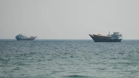 Reuters Vessels sail in the Strait of Hormuz. Photo: 12 July 2026