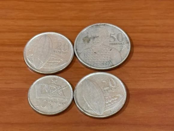 Bank of Ghana warns traders, transport operators against rejecting cedi coins