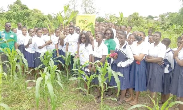 Some teachers and students of the Notre Dame Girl SHS after the tree planting exercise