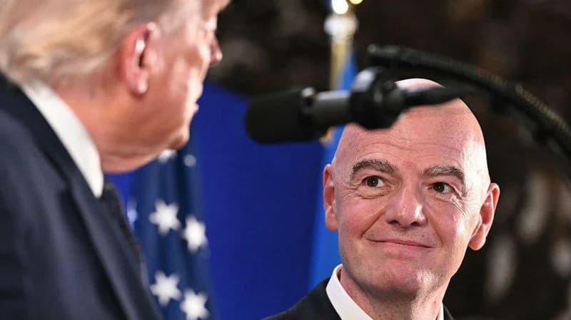 Fifa president Gianni Infantino looks at US president Donald Trump during a press conference at the 2026 World Cup