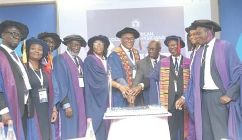 Dr Henry Lawson (middle), Vice-President, West Africa College of Physicians, Ghana Chapter, together with Dr Edwin Wiredu (3rd from left), Consultant Pathologist, Korle-Bu Teaching Hospital, Dr Collins Kokuro (left), Secretary, Ghana Chapter, and some officers of the Ghana Chapter, cutting the 50 years celebration cake during the annual general meeting. Picture: BENEDICT OBUOBI