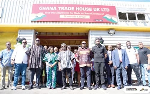 Officials in front of the Trade Hub