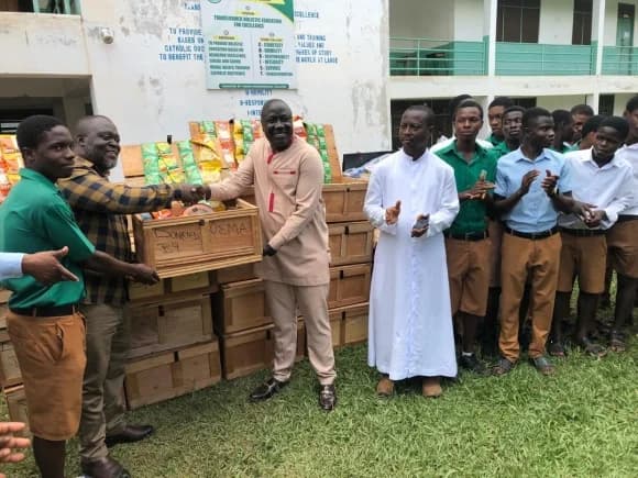 Obuasi East Assembly donates relief items to 32 Christ the King Catholic SHS fire victims