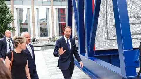 NTB / AFP via Getty Images Crown Prince Haakon of Norway gestures to a crowd. Photo: July 2026