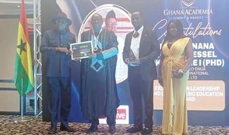 Nana Francis Essel Okyeahene (2nd from left) receiving the award