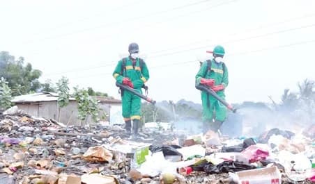 Some environmental officers spraying one of the locations.