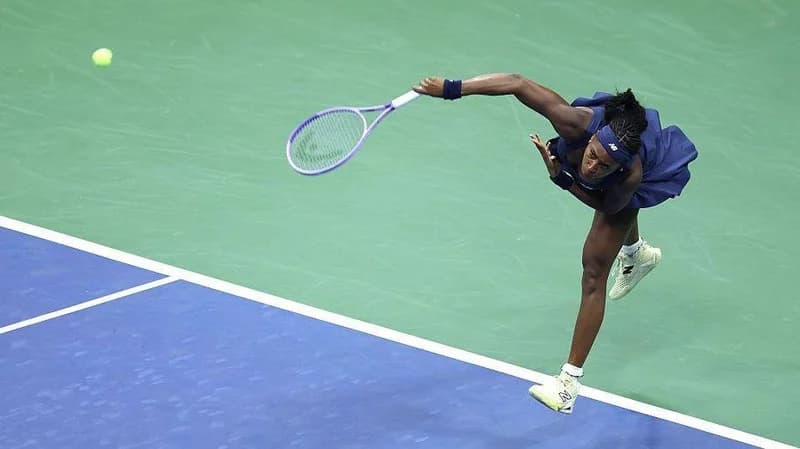 Coco Gauff hits a serve during her 2026 US Open match against Zeynep Sonmez
