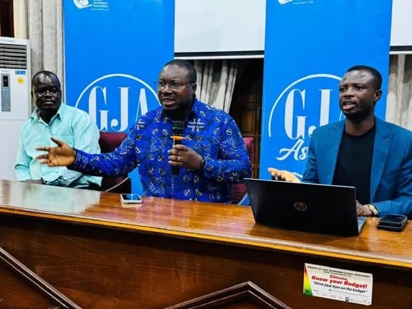 Kofi Adu Domfeh(middle), the Ashanti Regional Chairman, GJA, speaking at the awards launch in Kumasi. Flanking him are Nicolas Osei-Wusu(left), Regional Vice Chairman, and Isaac Justice Bediako, Chairman, Awards Planning Committee.