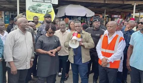 Samuel Nartey George (middle), Minister of Communication, Digital Technology and Innovations, addressing stakeholders at the transport station. With him are Rita Akosua Adjei Awatey (2nd from left), Eastern Regional Minister, and other officials