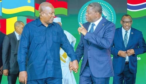 President John Mahama (left) interacting with President Faure Gnassingbé of Togo