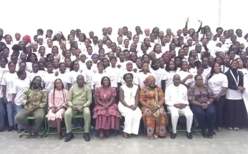 Officials and some beneficiary young women who attended the event