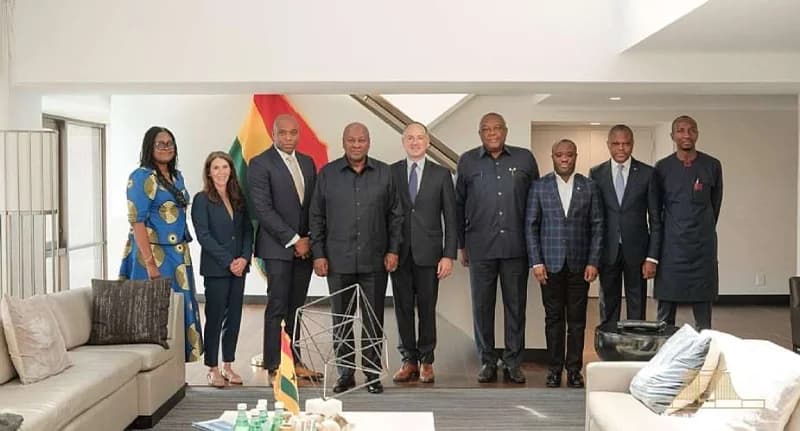President John Mahama (center) stands with a delegation from Boeing and Ghanaian government officials in a formal indoor setting. The group is gathered for a photograph following discussions regarding the 18-month timeline for the revival of Ghana's national airline.