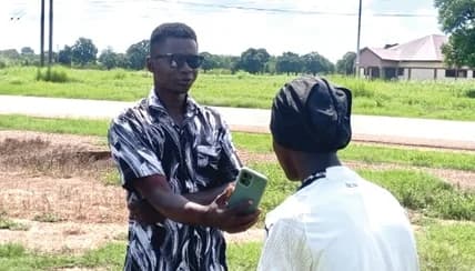 Atule Awuni sharing his ordeal with Gilbert Azeem Tiroog, Upper East Regional Correspondent of the Daily Graphic