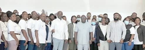 Dr Julius Debrah (arrowed), Chief of Staff, Emmanuel Kwadwo Agyekum (left to the Chief of Staff), Minister of Labour, Jobs and Employment; other officials, and some of the beneficiaries of the programme
