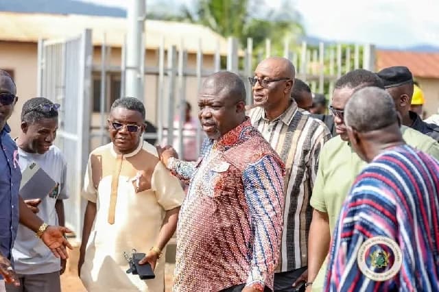 Samuel Nartey George inspects rural telephony site at Akoefe Gadza