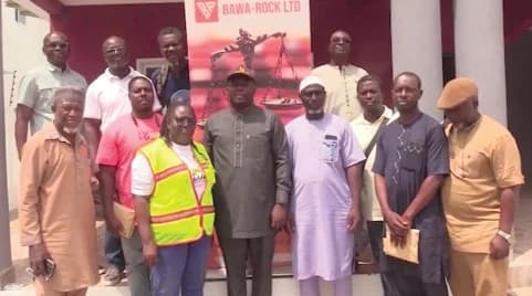 Eric Addae Boateng (middle in black), Bawa-Rock Ltd Business Development Manager, with the beneficiaries